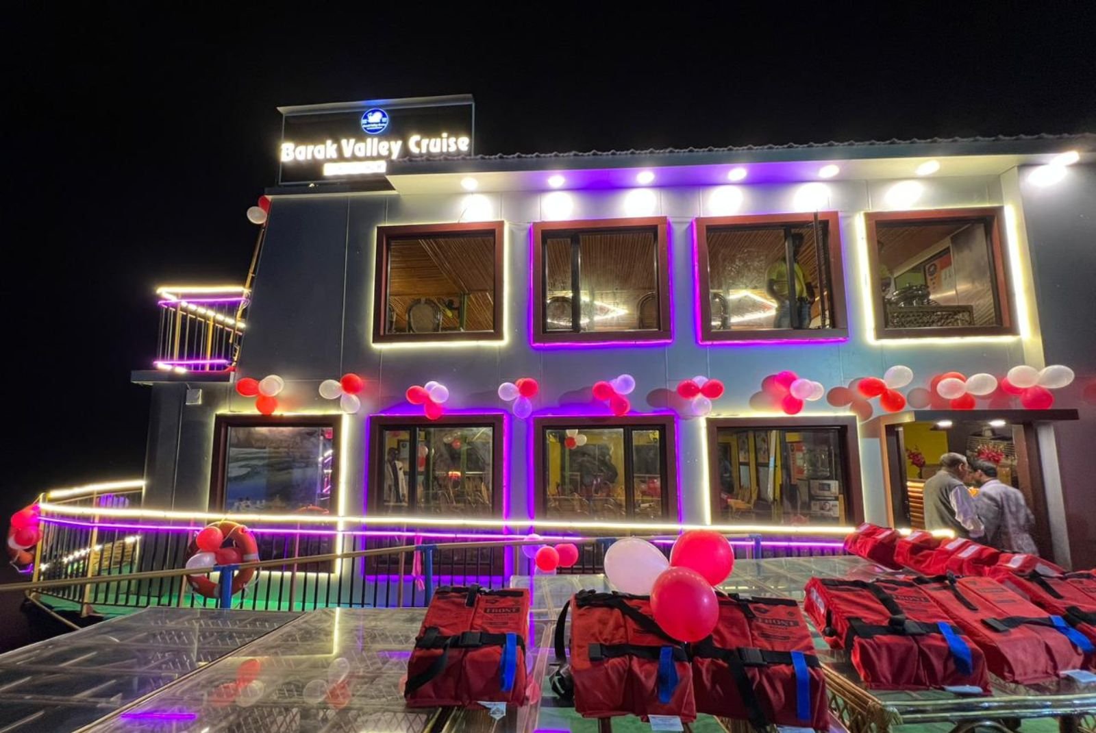 Barak Valley Cruise floodlit on the night of her launch at Silchar, a crowd gathered along the riverbank.